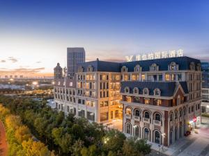 Vienna International Hotel Xi'an Fengdong Football Center Branch