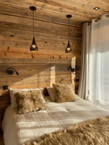 Chalets Un Ecrin de Serenite Face aux Montagne chalet nathalya : photos des chambres