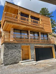 Chalets Un Ecrin de Serenite Face aux Montagne chalet nathalya : photos des chambres