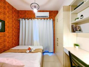 1BR Condotel with Balcony at FAME Residences #FM04