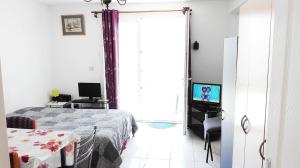 Sejours chez l'habitant Residence des Deux Plages : photos des chambres