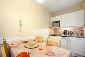 Appartements Appartement aux pieds des pistes : photos des chambres