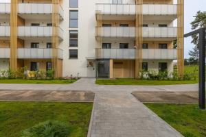 Aquamarina Dąbki - Tuż przy Plaży z Parkingiem by Noclegi Renters