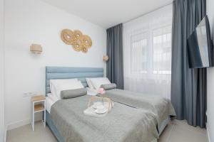 Aquamarina Dąbki - Tuż przy Plaży z Parkingiem by Noclegi Renters