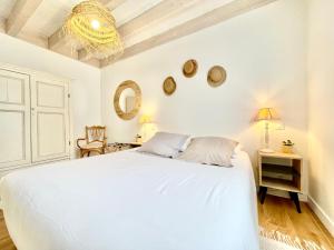 Appartements 300 m Plage et Centre Ville - Parking Privatif et Gratuit sur Place - Terrasse Bois : photos des chambres