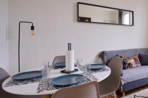 Appartements Cosy T1 with garage near CDG | By Airnest : photos des chambres
