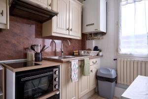 Appartements Cosy T1 with garage near CDG | By Airnest : photos des chambres