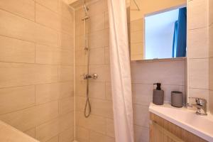 Appartements Cosy T1 with garage near CDG | By Airnest : photos des chambres