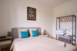 Appartements Cosy T1 with garage near CDG | By Airnest : photos des chambres