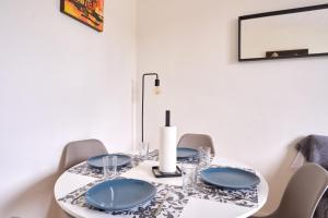 Appartements Cosy T1 with garage near CDG | By Airnest : photos des chambres