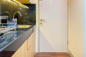 Good and Simply Studio Tokyo Riverside PIK 2 Apartment By Travelio