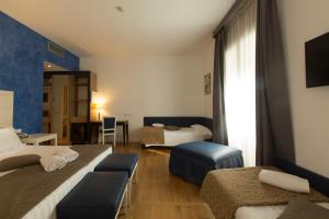 Deluxe Quadruple Room room in Floris Hotel
