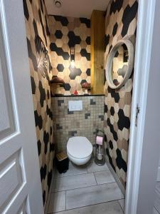 B&B / Chambres d'hotes L-Escale Arc-en-Ciel : photos des chambres