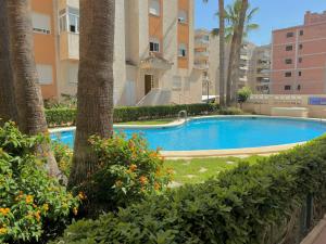.Apartamento 1a linea de playa + piscina + parking DAIMUS