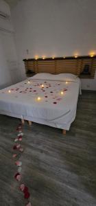 Appartements Maison Plus Belle La Nuit avec jacuzzi prive : photos des chambres