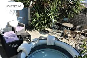 Maisons de vacances Villa vue mer et jacuzzi : photos des chambres