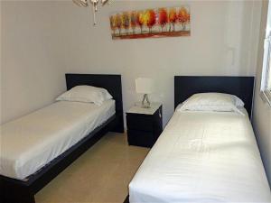 21 Alcazaba Lagoon groundfloor apt tropical garden