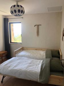 Appartements La Chataigne Perchee, piscine et nature : photos des chambres