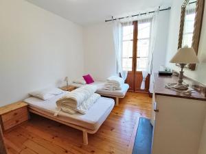 Appartements Le petit cerf, T3, wifi, cave : photos des chambres