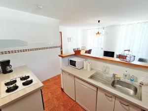 Appartements Le petit cerf, T3, wifi, cave : photos des chambres