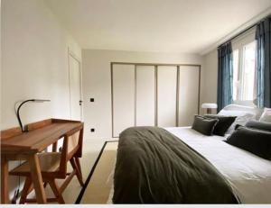 Appartements Au Vieux Bassin : photos des chambres