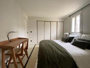 Appartements Au Vieux Bassin : photos des chambres