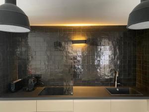 Appartements Au Vieux Bassin : photos des chambres