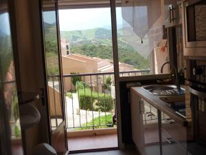 Appartements Appartement Climatise avec Vue Mer et Montagne : photos des chambres