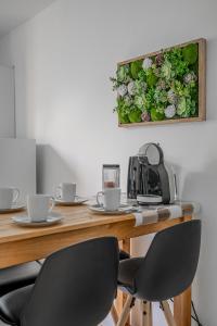 Appartements Le Jardin Secret : photos des chambres