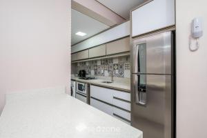 Apto com churrasqueira próximo ao mar DOV108