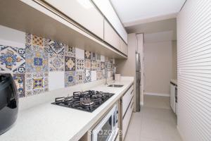 Apto com churrasqueira próximo ao mar DOV108