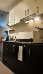 NITO Modern Philippine Styled Home at Jazz Residences Makati