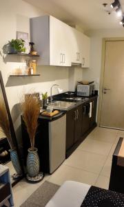 NITO Modern Philippine Styled Home at Jazz Residences Makati