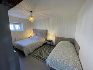 Maisons de vacances Gite en pleine nature pres de la Loire, ideal famille ou amis, proche des vignobles et sites historiques. - FR-1-590-434 : photos des chambres