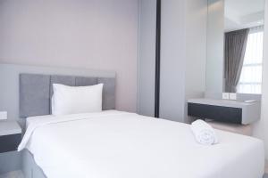 Spacious and Elegant 2BR Apartment at The Kencana Residence By Travelio