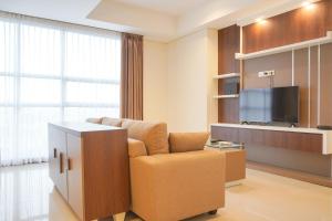 Nice and Comfort 2BR Apartment at The Kencana Residence By Travelio