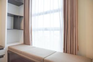 Nice and Comfort 2BR Apartment at The Kencana Residence By Travelio