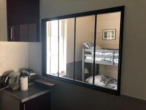 Appartements Maison 3 ch avec acces piscine chauffee couverte : photos des chambres