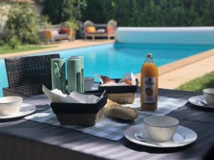 Appartements LES LOGES DE BACCHUS Le Carpe Diem : photos des chambres
