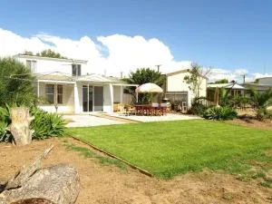 Pink Door by the Seashore - Nectar Brook