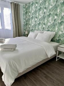 Appartements Charmant appart avec vue sur lac : photos des chambres