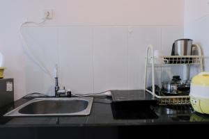 Homey Studio Room at 7th Floor Gateway Pasteur Apartment By Travelio