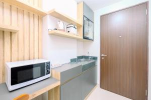 Minimalist and Good Deal Studio Transpark Cibubur Apartment By Travelio