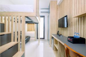 Minimalist and Good Deal Studio Transpark Cibubur Apartment By Travelio