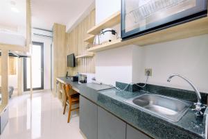 Minimalist and Good Deal Studio Transpark Cibubur Apartment By Travelio