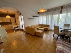 Residence Triangolo Trilocale con terrazzo vista mare parziale - Agenzia Cocal