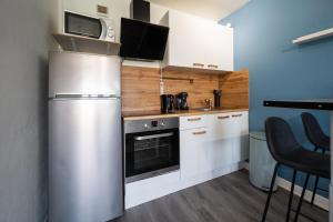Appartements Le Studio du commandant : photos des chambres