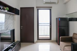 Comfort and Cozy Stay 2BR at 29th Floor Transpark Cibubur Apartment By Travelio
