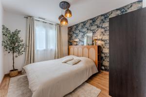 Maisons de vacances La Boheme du Lac - Maison climatisee avec piscine : photos des chambres