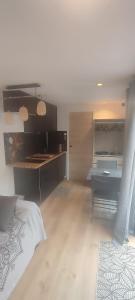 Appartements Chaleureux Studio : photos des chambres